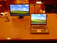 Counsel table with monitor and laptop 